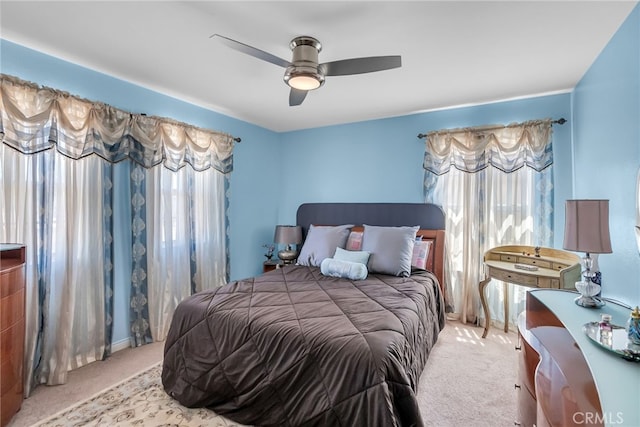 bedroom with carpet floors and a ceiling fan