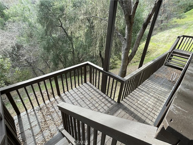 deck with a forest view