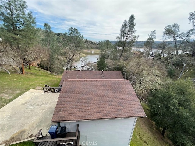 drone / aerial view featuring a water view