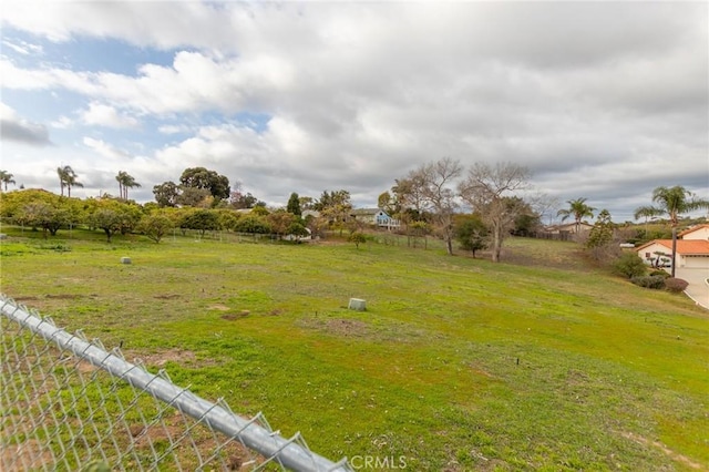 view of yard with fence