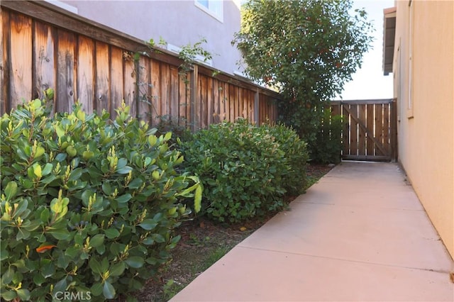 exterior space featuring a gate and fence