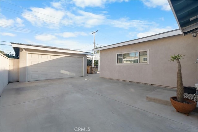 detached garage with fence