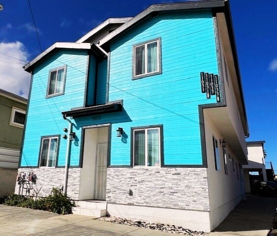 view of front facade featuring stone siding