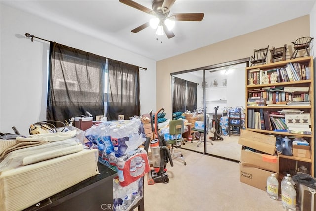 interior space with ceiling fan