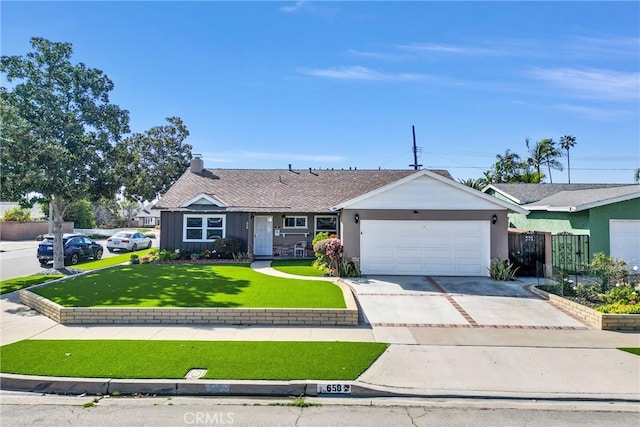 ranch-style house featuring driveway, a garage, fence, a front yard, and stucco siding