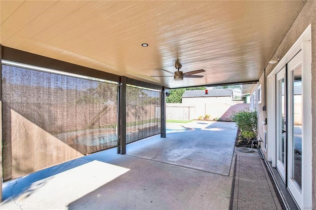 view of patio featuring ceiling fan