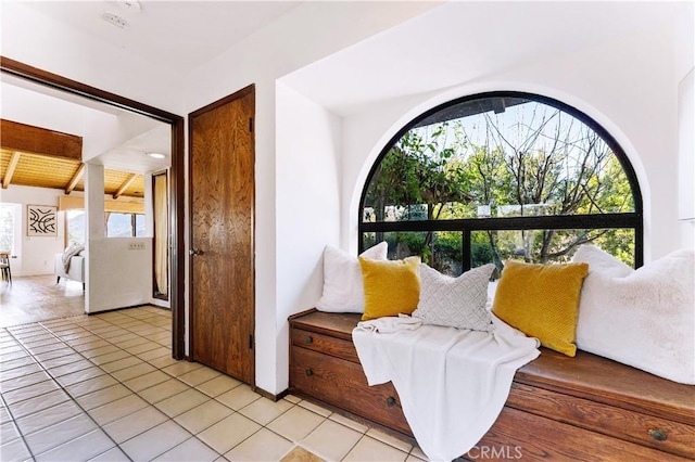 sitting room with light tile patterned floors