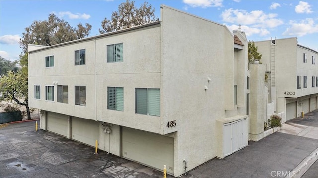 view of property featuring an attached garage