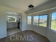 unfurnished dining area with light tile patterned floors