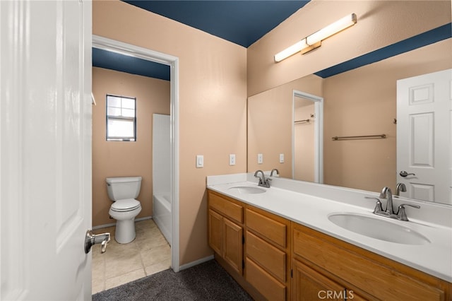 full bathroom featuring tile patterned flooring, a sink, toilet, and double vanity