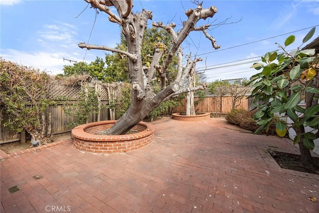 view of patio with a fenced backyard