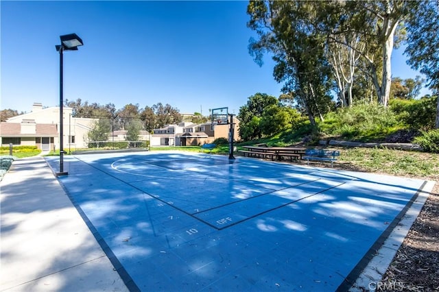 view of sport court featuring community basketball court