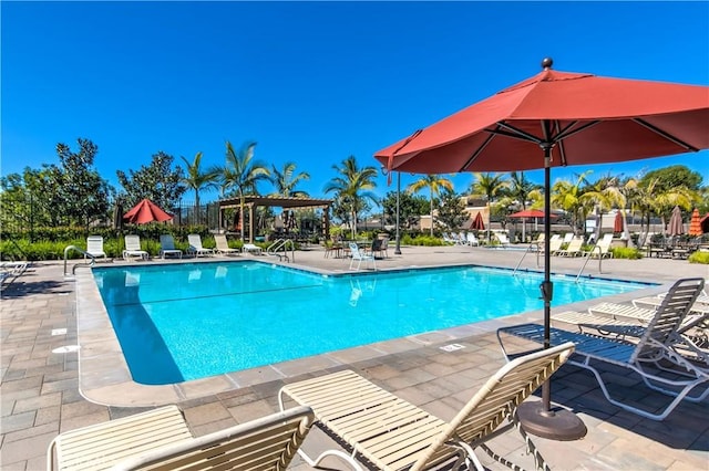 pool with a patio