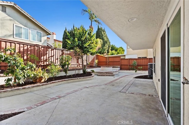 view of patio with a fenced backyard