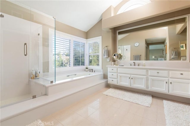 full bathroom featuring a stall shower, a garden tub, tile patterned flooring, vaulted ceiling, and vanity