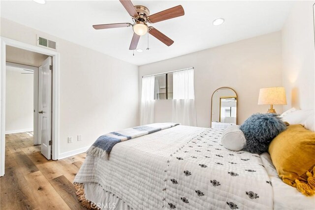 12564 Montecito Rd Unit 4, Seal Beach, CA 90740 - bedroom featuring light wood-type flooring, recessed lighting, and a ceiling fan