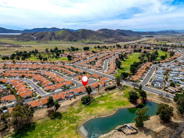 bird's eye view featuring a residential view and a water and mountain view