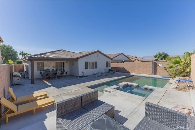 view of pool with a fenced backyard, outdoor dining area, and a patio