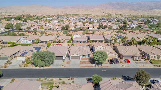 drone / aerial view with a mountain view and a residential view