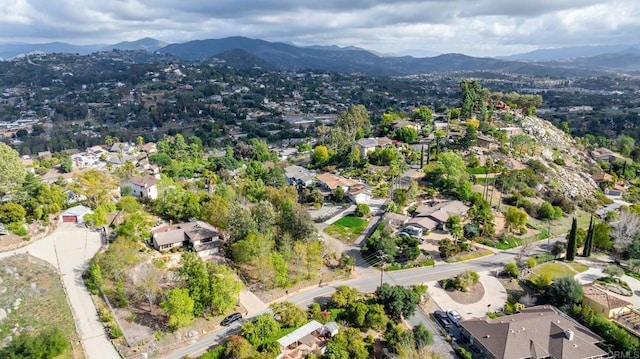 bird's eye view featuring a residential view and a mountain view