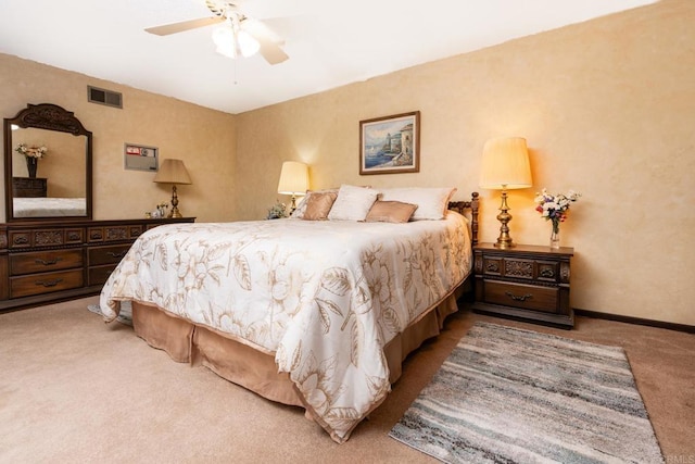 bedroom with visible vents, ceiling fan, light carpet, and baseboards