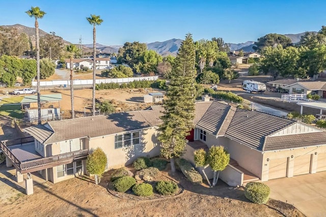 birds eye view of property with a residential view and a mountain view