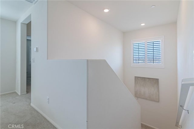 stairs with recessed lighting, baseboards, and carpet floors