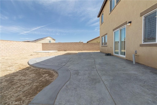 view of patio featuring a fenced backyard