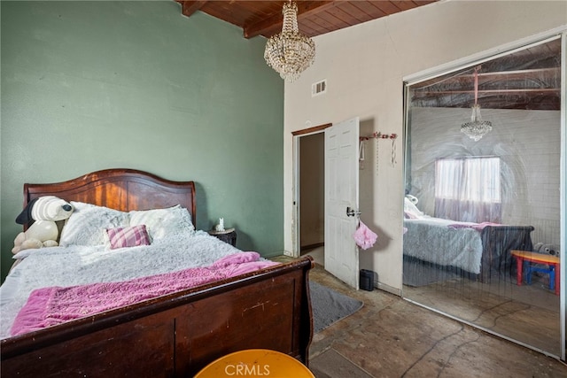 bedroom with a notable chandelier, wood ceiling, visible vents, and beam ceiling