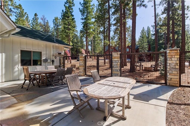 view of patio / terrace with outdoor dining area and fence