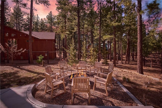 view of patio / terrace featuring an outdoor fire pit