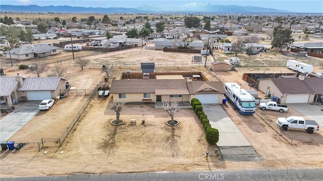 bird's eye view featuring a residential view and a mountain view