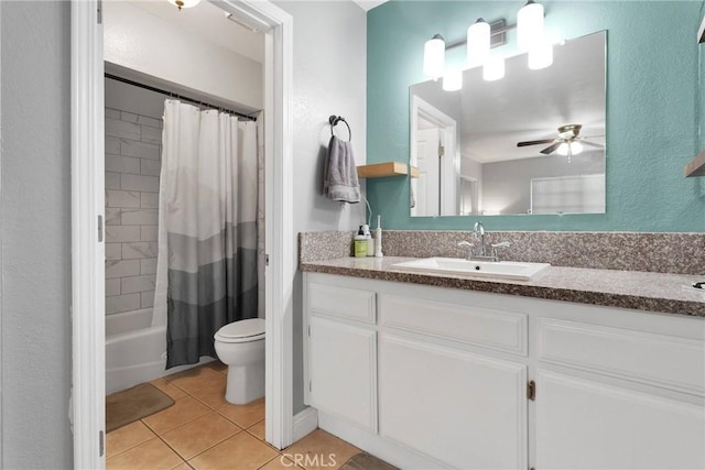 full bath featuring ceiling fan, toilet, shower / tub combo, vanity, and tile patterned floors