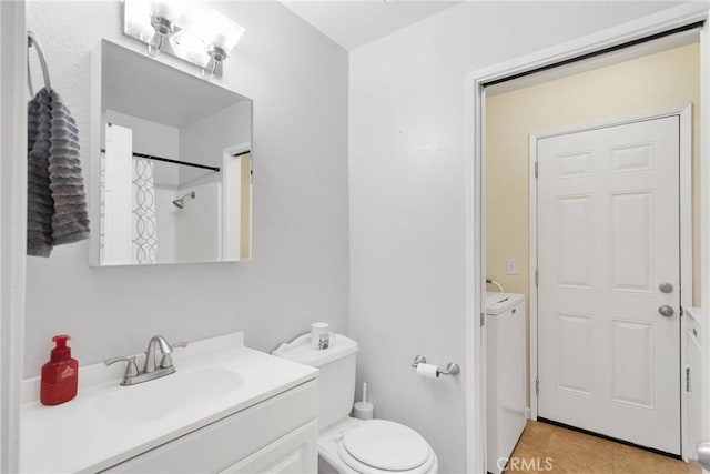 full bathroom featuring curtained shower, tile patterned flooring, toilet, vanity, and independent washer and dryer