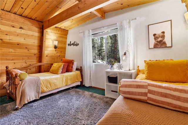 bedroom featuring carpet floors, wood ceiling, and beamed ceiling