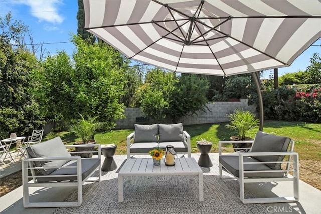 view of patio with a fenced backyard and an outdoor hangout area