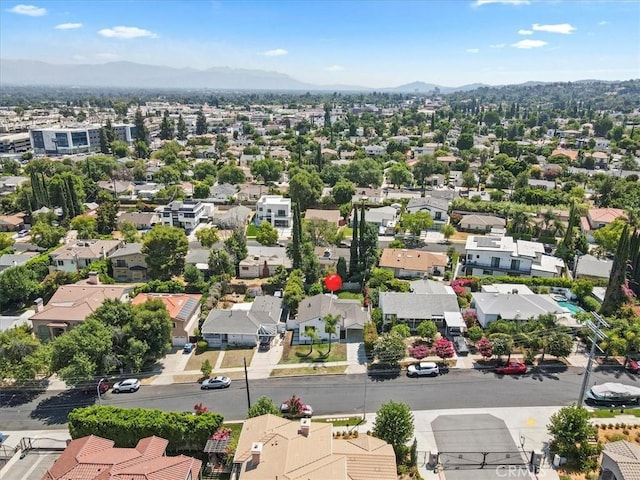 birds eye view of property with a residential view and a mountain view