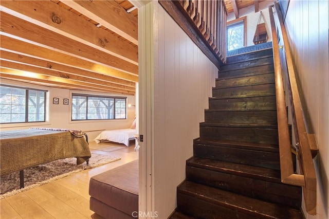 stairs with wood finished floors