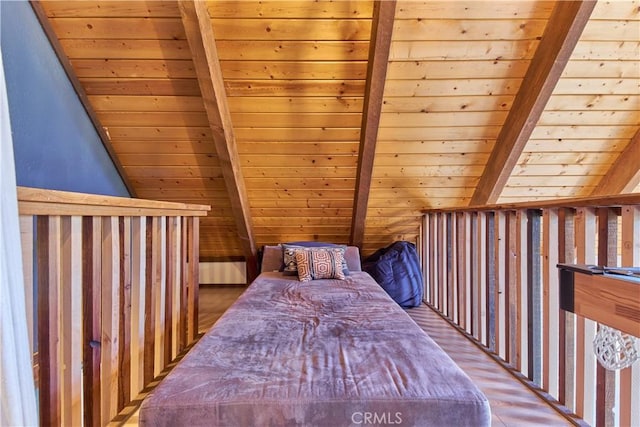 unfurnished bedroom with wood ceiling, lofted ceiling with beams, and wood finished floors