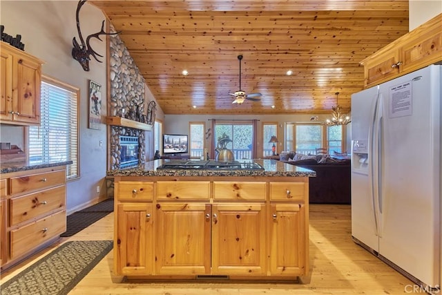 kitchen featuring wooden ceiling, open floor plan, stainless steel gas stovetop, light wood-type flooring, and white fridge with ice dispenser