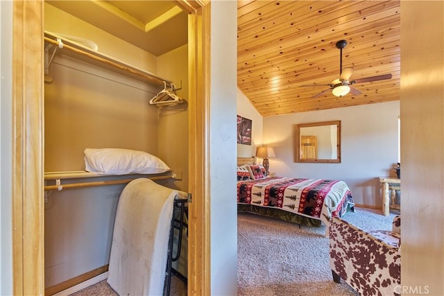 bedroom featuring carpet floors, wood ceiling, and lofted ceiling