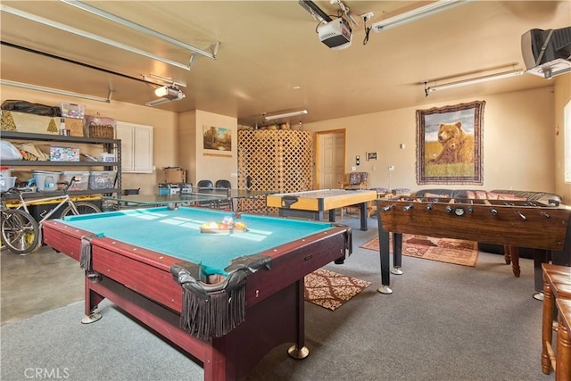 game room with a garage, concrete flooring, and pool table