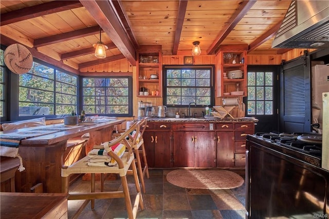 kitchen with exhaust hood, wood ceiling, open shelves, stone finish floor, and gas stove