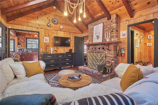 living area featuring vaulted ceiling with beams, a brick fireplace, wooden ceiling, and wood walls