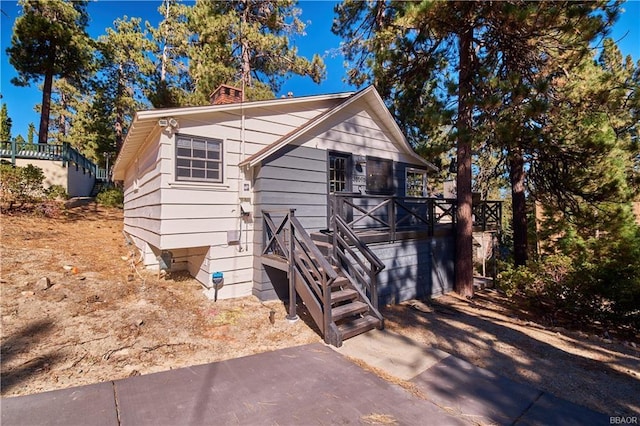 view of front of property with a chimney