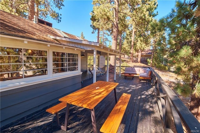 wooden deck featuring an outdoor hangout area