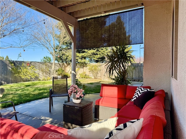 view of patio / terrace featuring a fenced backyard and an outdoor living space