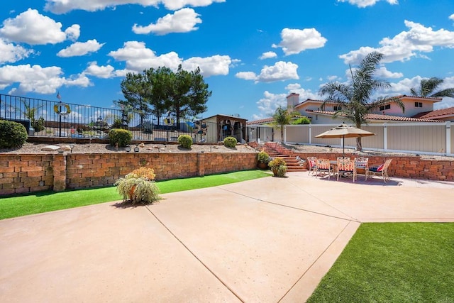 view of patio / terrace with fence