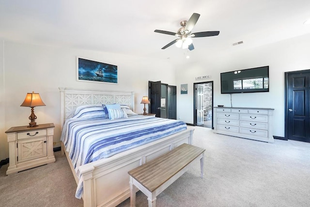 bedroom featuring light carpet, visible vents, and a ceiling fan