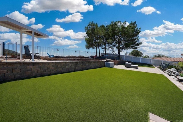 view of yard featuring a patio area and fence